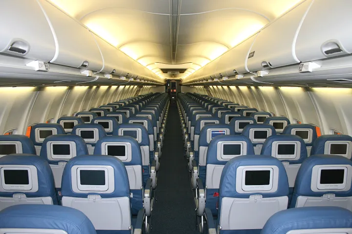 Narrow-Body Interior (Boeing 737). Notice the single aisle